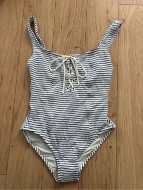 SOLID & STRIPED Black and White Striped Lace-Up One-Piece